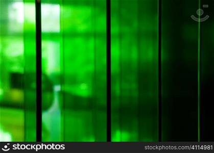 Green panelled background with shadows