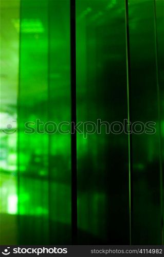 Green panelled background with shadows