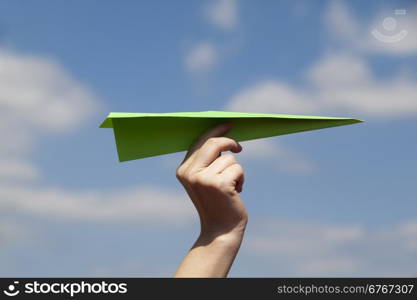 Green paper plane