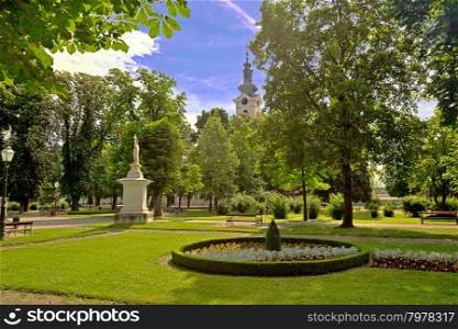 Green park and church in Bjelovar view, Croatia