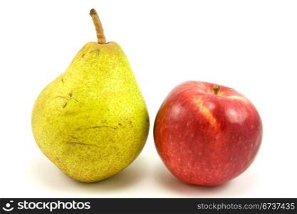 green pear and red apple on white background
