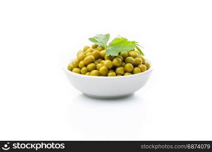 green peas in a bowl isolated, white background