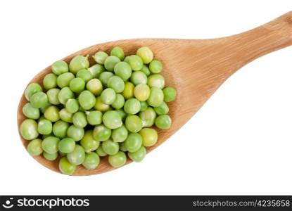 Green peas in wooden spoon