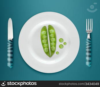 green peas on white plate with knife and fork on blue background.