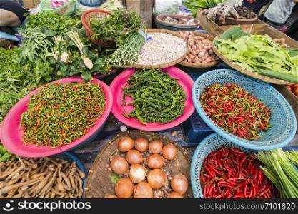 green peper and chili at the food market in the city of Phrae in the north of Thailand. Thailand, Phrae November, 2018.. THAILAND PHRAE FOOD MARKET PEPER