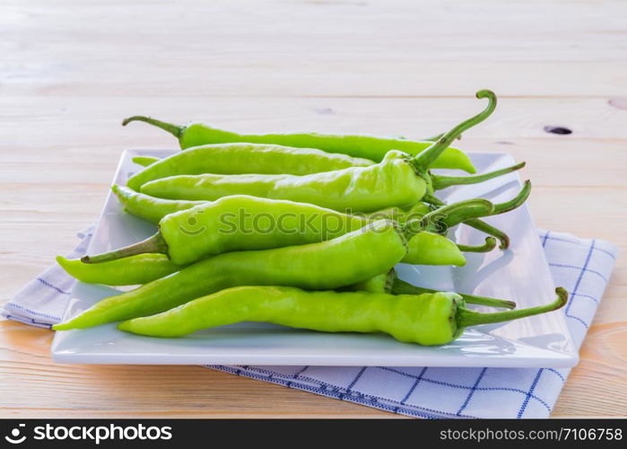 Green pepper on a plate For Cooking