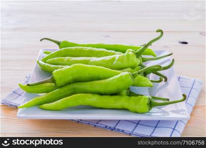 Green pepper on a plate For Cooking
