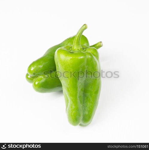 Green pepper on white background