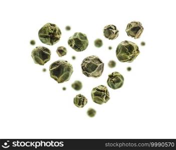 Green peppercorns in the shape of a heart on a white background.. Green peppercorns in the shape of a heart on a white background