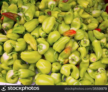 Green peppers in a market display as a pattern