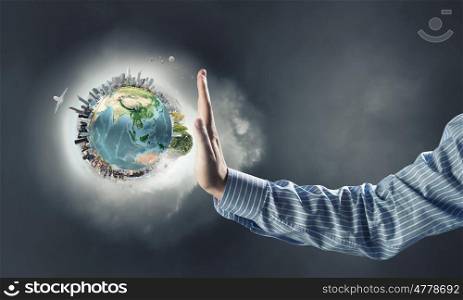 Green planet. Close up of human and Earth planet. Elements of this image are furnished by NASA