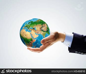 Green planet. Image of Earth planet in human hands. Protect planet. Elements of this image are furnished by NASA
