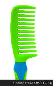green plastic comb on a white background