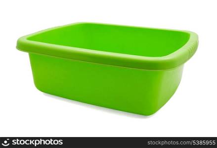 Green plastic wash basin isolated on white