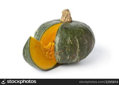 Green pumpkin with a slice on white background