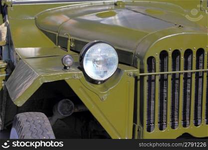 green retro car headlight