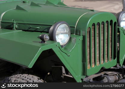 green retro car headlight