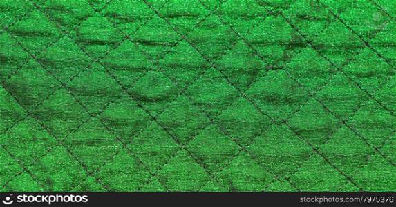 Green rhomboid fabric background