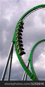 Green roller coaster loop.