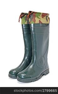 green rubber boots on white background
