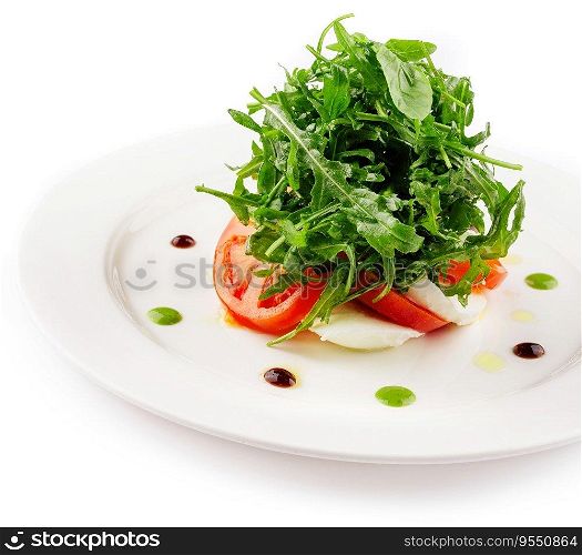 Green salad with arugula, tomato and feta cheese