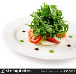 Green salad with arugula, tomato and feta cheese