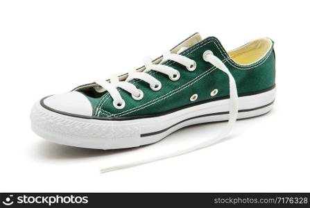 Green sneaker on a white background