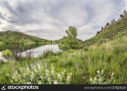 green springtime landscape at Colorado foothills - fisheye lens view on Horsetooth Reservoir near Fort Collins