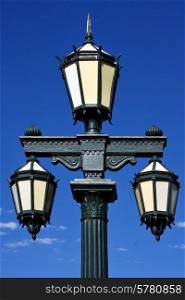 green street lamp and clouds in buenos aires argentina