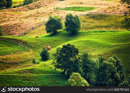Green summer landscape scenic view. Green hills in mountain valley. Summer mountain landscape.. Green hills in mountain valley