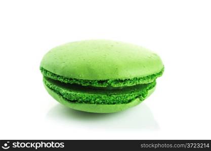 green Tasty colorful macaroon with kiwi flavor on white background