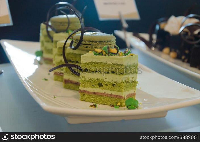 Green tea cake on dish.