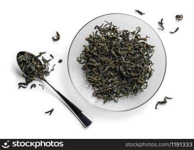 Green tea on a white background. The view from the top.. Green tea on a white background. The view from the top