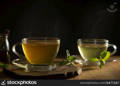 green tea with mint leaf on wooden table
