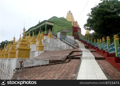 Green temple on the top of Sagaing hill near Mandalay, Myanmar