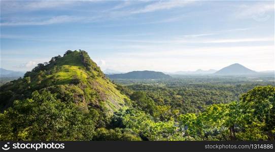 Green valley and blue sky, Ceylon scenery. Landscape of Sri Lanka. Green valley and blue sky, Ceylon scenery