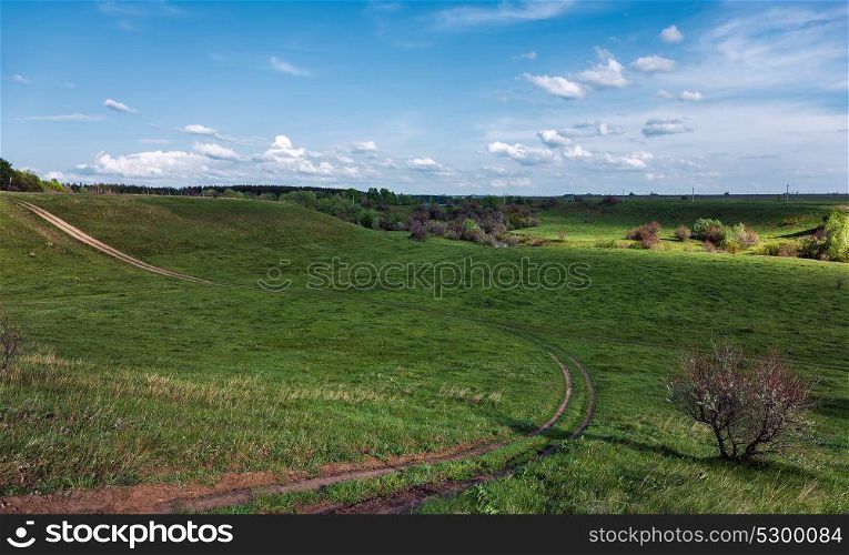 Green valley with a ravine in the countryside