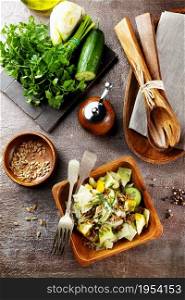 Green vegan salad with sunflower seeds. Healthy vegetarian food concept.