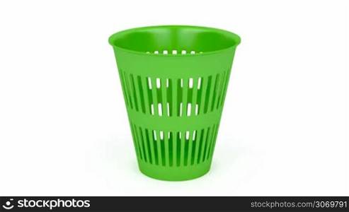 Green waste basket on white background