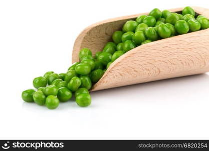 Green wet raw peas vegetable in scoop on white background