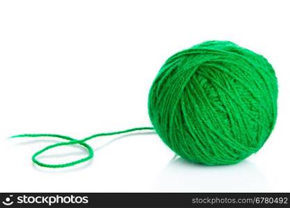Green wool yarn ball isolated on white background