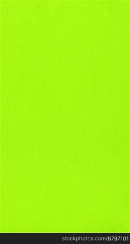 Green yellow color paper - vertical. Yellow green colour paper useful as a background - vertical