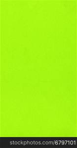 Green yellow color paper - vertical. Yellow green colour paper useful as a background - vertical