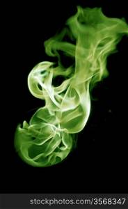 greenish fire with a black background, abstract background.