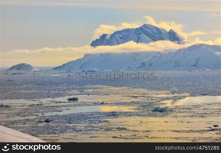 Greenland Fjord with Sea Ice in spring time
