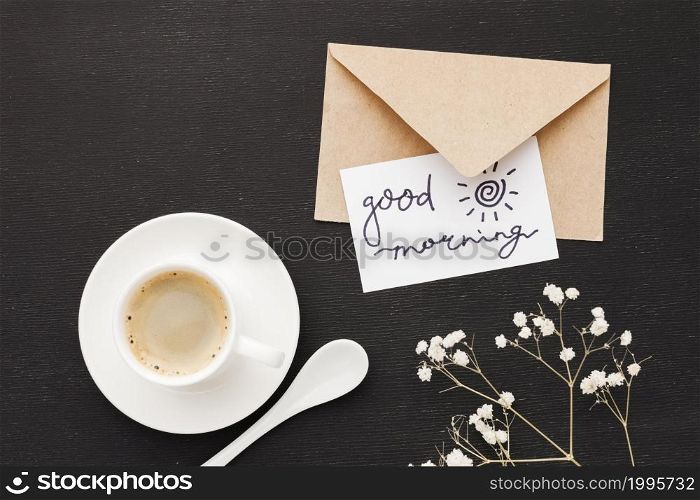 greeting card beside cup coffee