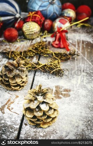 Greeting card for Christmas. Christmas composition with pine cones and ornaments