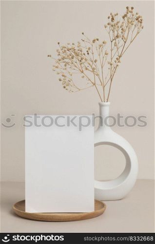 greeting card front view and dry flower in vase ceramic on table