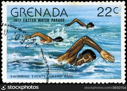 GRENADA - CIRCA 1977: A stamp printed in Grenada issued for the easter water parade shows swimming events grand anse, circa 1977.