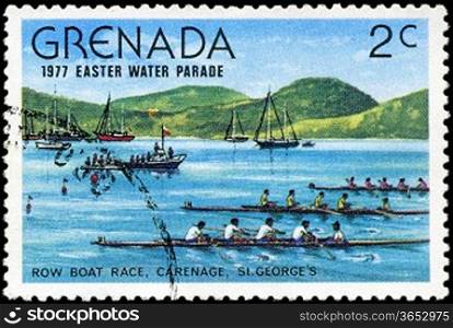 GRENADA - CIRCA 1977: A stamp printed in Grenada issued for the easter water parade shows row boat race, circa 1977.